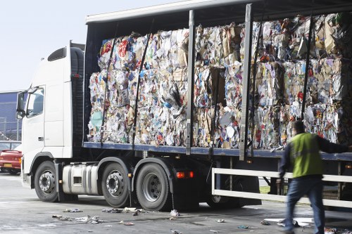 Waste trucks staged outside a Brompton commercial property ready for removal